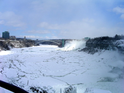 [Frozen Niagara River as seen from railing near Horseshoe Falls - looking downstream.]